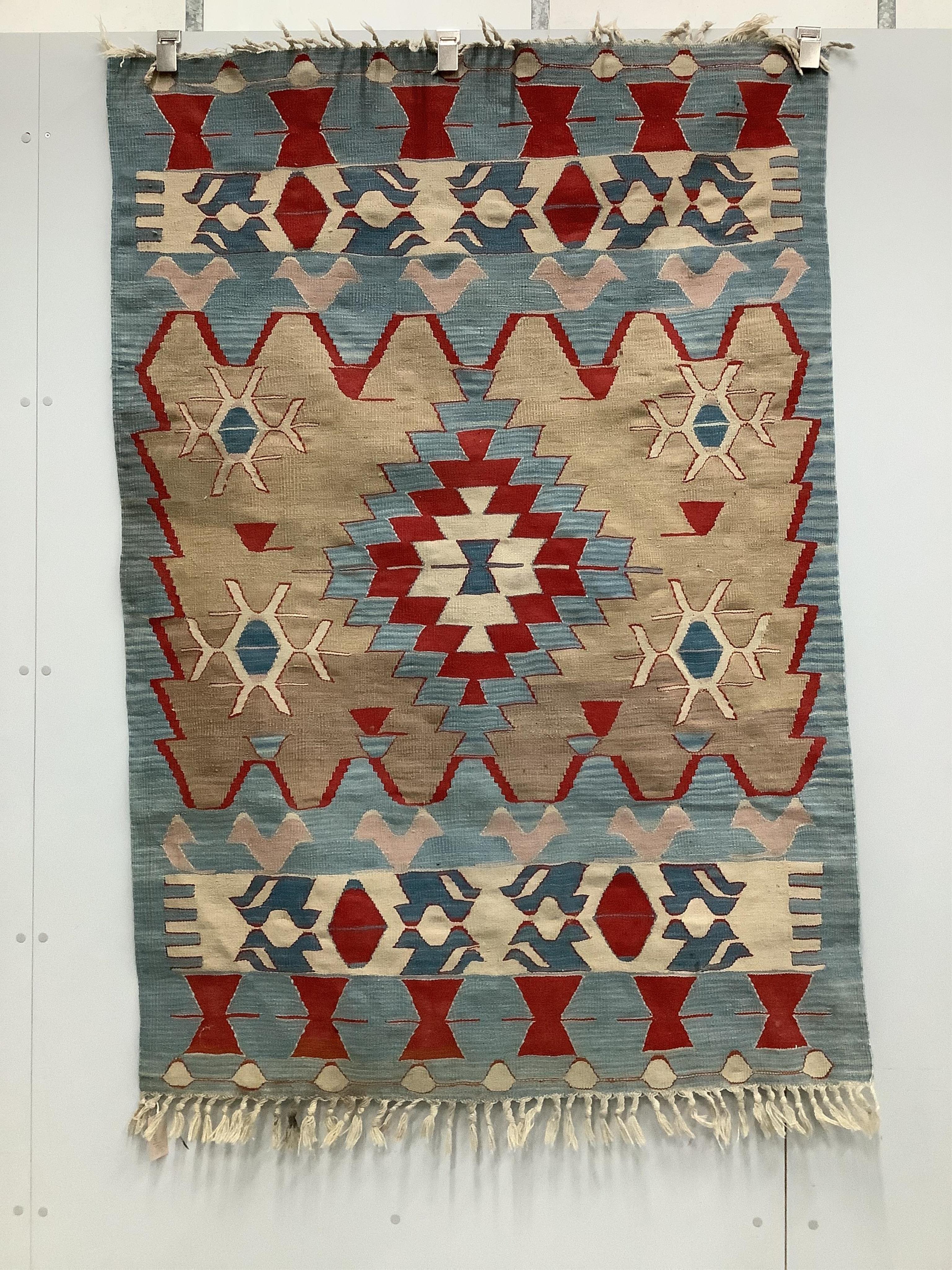 Two Kilim rugs, mat and two fragments, largest 170 x 120cm. Condition - fair